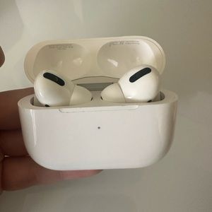 Apple Airpod Pros - left airpod and case